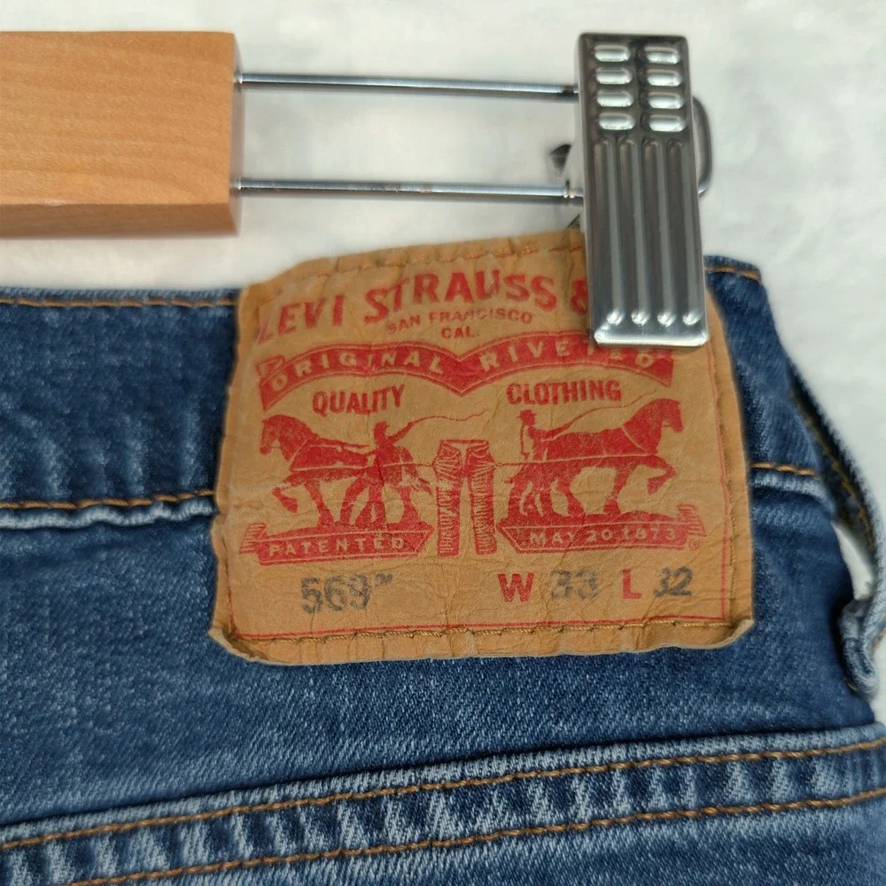 Levi's Jeans Mens 33x29 Blue 569 Loose Straight Leg Denim Red Tab Zip Fly‎ Baggy